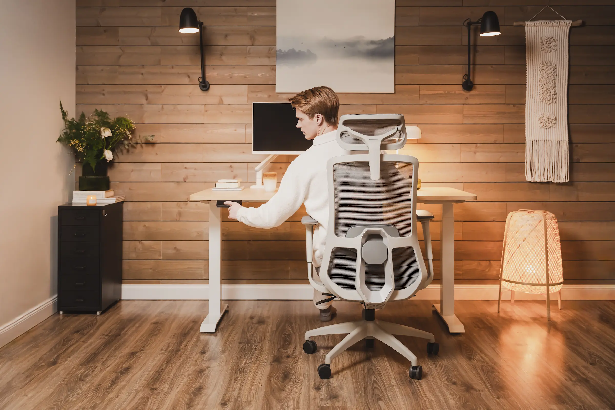 Desk arrangement viewed from above with tidy cabling paths